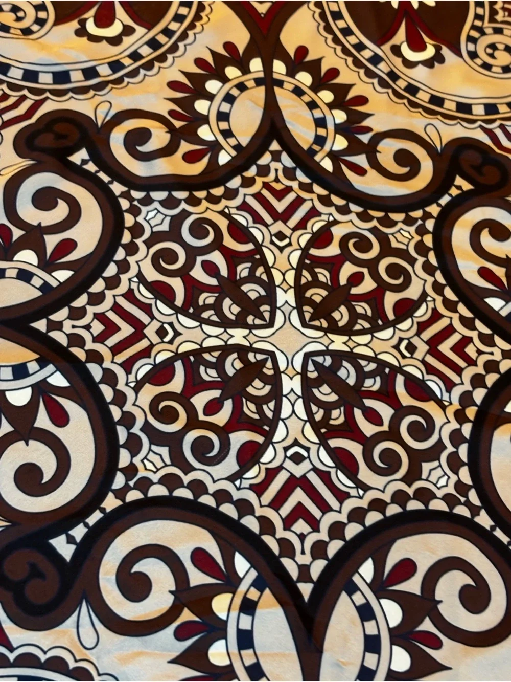 elegant brown, white, and burgundy silk scarf features an ornate floral